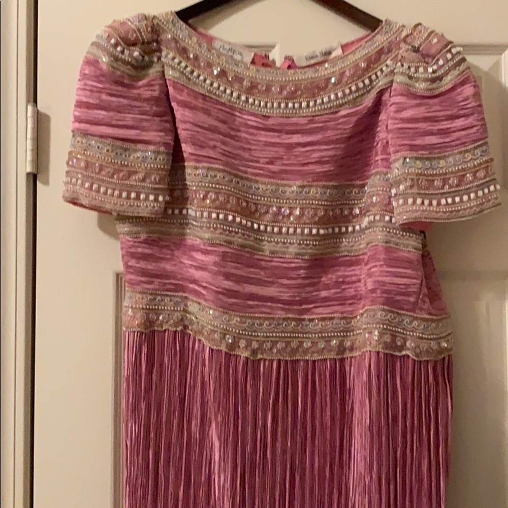 A formal dress McFadden Couture size 14